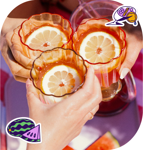 Three hands cheersing mocktails